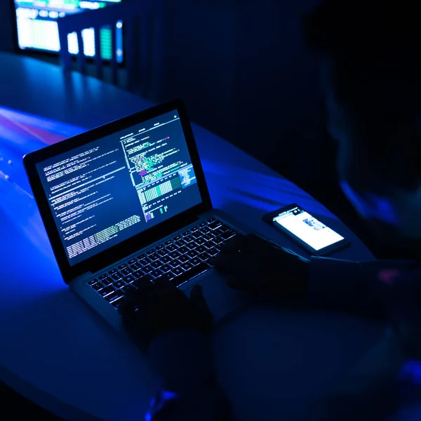 Crop Shot Man Using Laptop Hacking Security System Sitting Neon — Stock Photo, Image