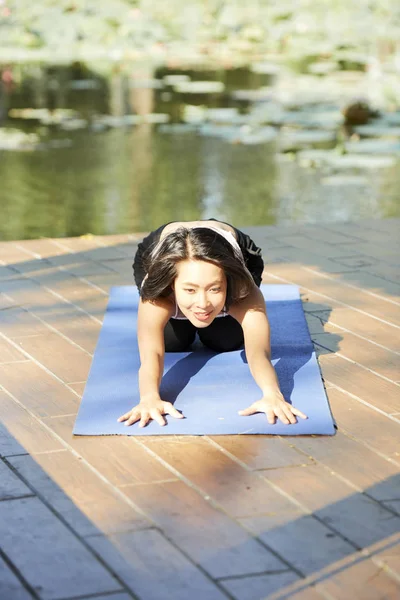 Pretty Smiling Young Asian Woman Stretching Forward Relax Doing Exercises — Stock Photo, Image