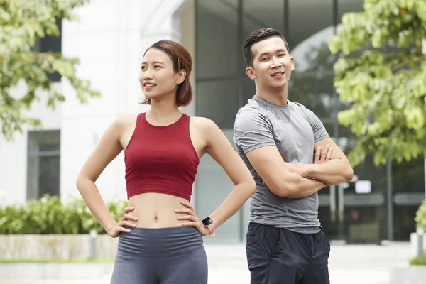 Positive Fitness Trainers Sports Clothes Standing Outdoots — Stock Photo, Image