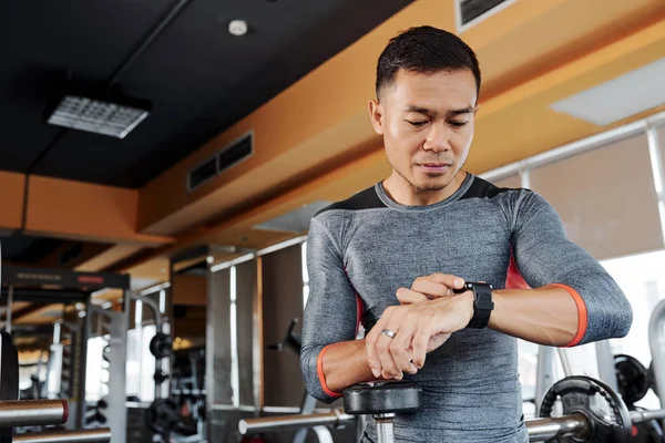 Young Fit Asian Man Checking His Pulse Smart Watch Working — Stock Photo, Image