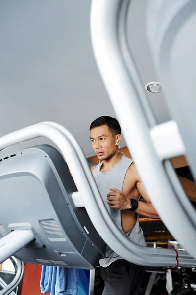 Determined Fit Young Vietnamese Man Jogging Treadmill Gym Morning — Stock Photo, Image