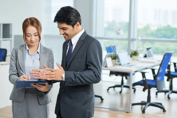 Smiling Male Executive Telling His Plans Work Day His Secretary — Stock Photo, Image