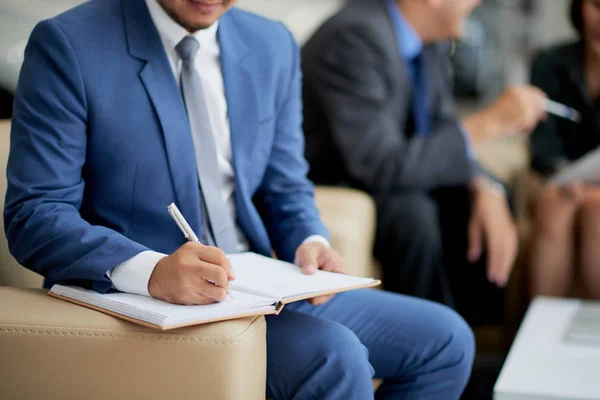 Close Businessman Suit Sitting Sofa Writing Business Plans Notepad His — Stock Photo, Image