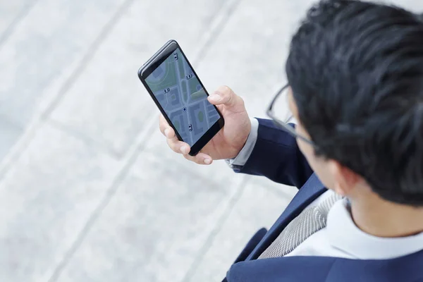 Businessman Checking Application His Smartwatch Waiting Taxi Outdoors — Stock Photo, Image