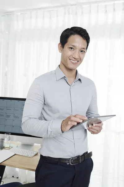 Portrait Smiling Happy Young Entrepreneur Standing His Office Table Working — Stock Photo, Image