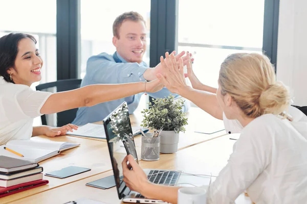 Group Business People Sitting Table Together Giving High Five Each — Stock Photo, Image