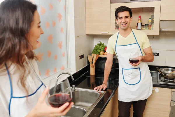 Portrait Handsome Young Smiling Man Apron Leaning Kitchen Counter Drinking — Stock Photo, Image