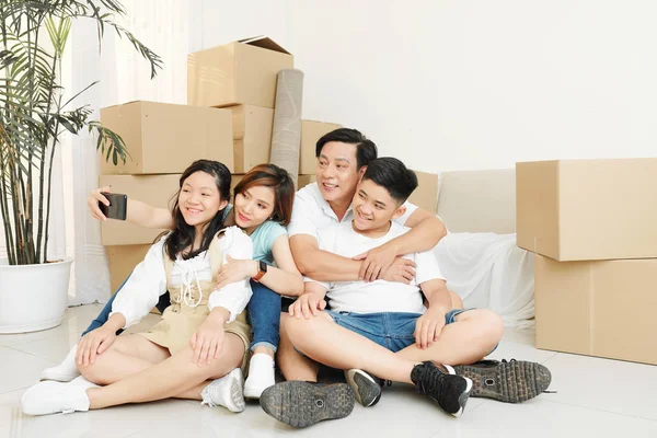 Happy Vietnamese Family Sitting Floor Room Full Cardboard Boxes Taking — Stock Photo, Image