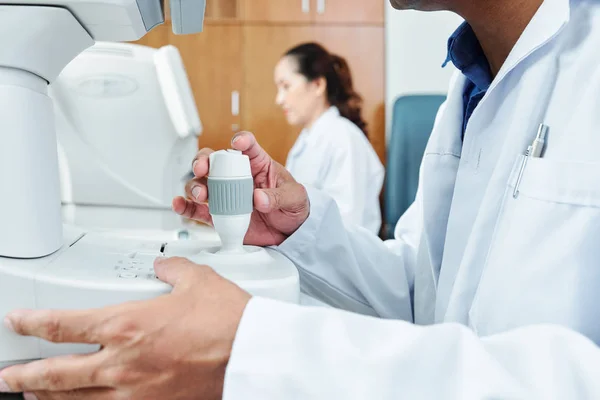 Close Male Doctor Working Medical Equipment His Asian Colleague Working — Stockfoto