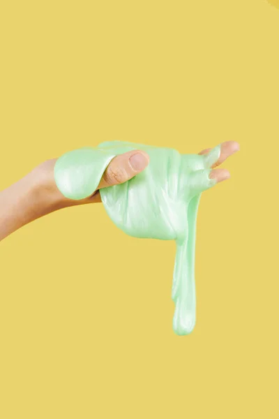 Dripping Green Slime Hand Person Yellow Background — Stock Photo, Image