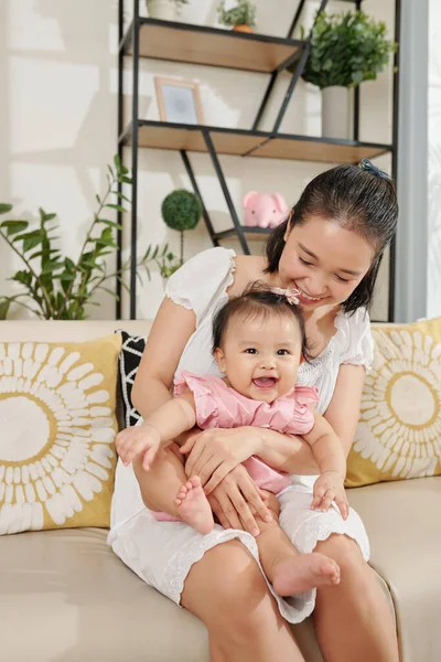 Cute Happy Little Girl Sitting Laps Her Mother Looking Camera — Stock Photo, Image