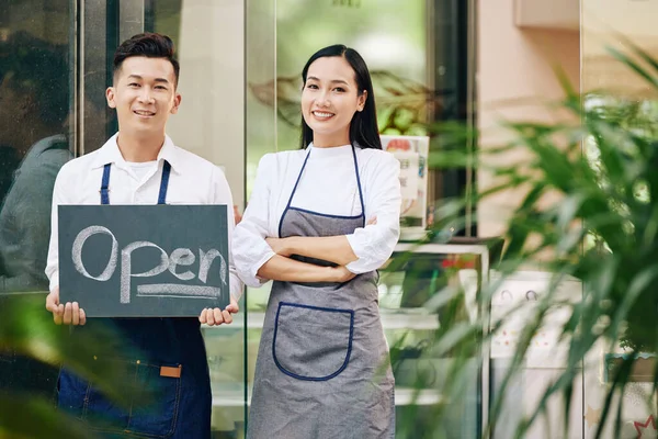 Portrait Happy Confident Young Waitress Waiter Showing Open Sign Opening — Stock Photo, Image