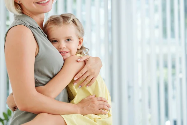 Cute Little Girl Hugging Her Mother Tight Looking Camera — Stock Photo, Image