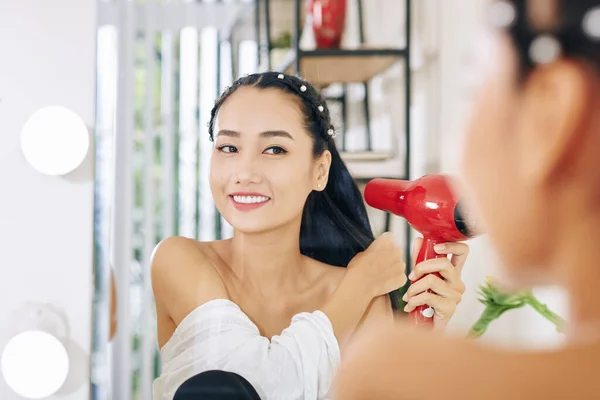 Cheerful Young Woman Sitting Vanity Using Fan Drying Her Hair — Stock Photo, Image