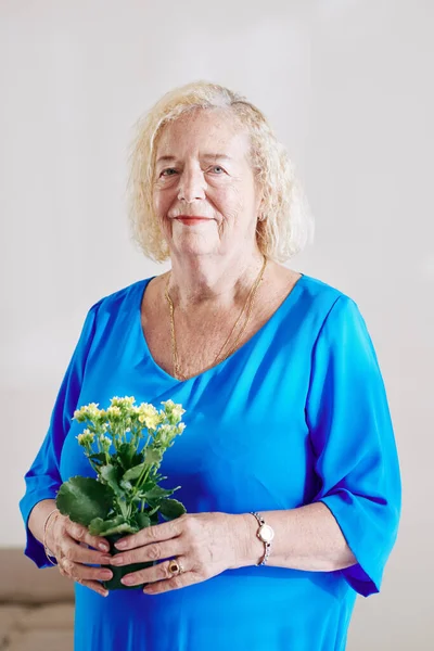 Portrait Smiling Senior Woman Blue Dress Posing Potted Flowers — Stock Photo, Image