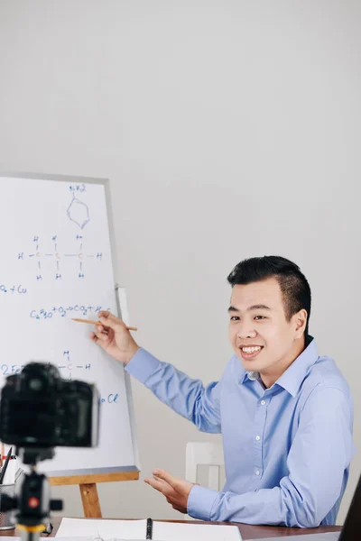 Young Smiling Chemistry Teacher Pointing Chemical Formula Whiteboard Conducting Online — Stock Photo, Image