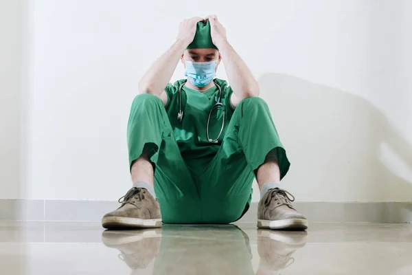 Stressed Tired Young Surgeon Sitting Floor Hospital Corridor Difficult Surgery — Stock Photo, Image
