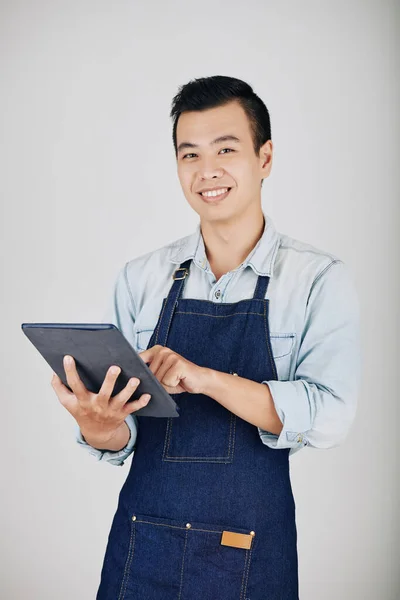 Studio Shoot Smiling Coffeeshop Owner Denim Apron Using Application Tablet — Stock Photo, Image