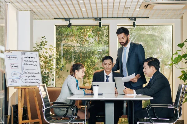 Group Colleagues Gathered Table Meeting Room Discuss Results Work — Stock Photo, Image