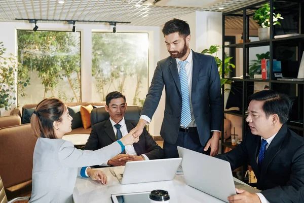Young Businessman Introducing Himself Shaking Hand Female Entrepreneur Meeting — Stock Photo, Image