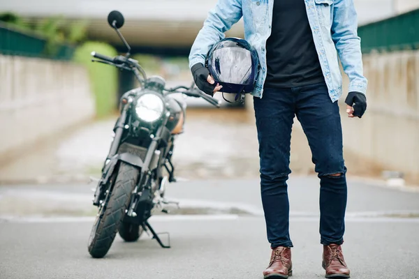 Cropped Image Motorcyclist Jeans Leather Boots Holding Helmet His Motorcycle — Stock Photo, Image