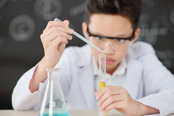 Vietnamese Schoolboy Adding Drop Reagent Test Tube Yellow Liquid — Stock Photo, Image