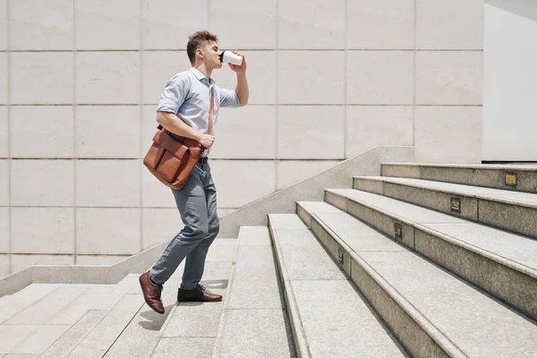 Sleepy Young Entrepreneur Walking Stairs Hurrying Work Drinking Take Away — Stock Photo, Image