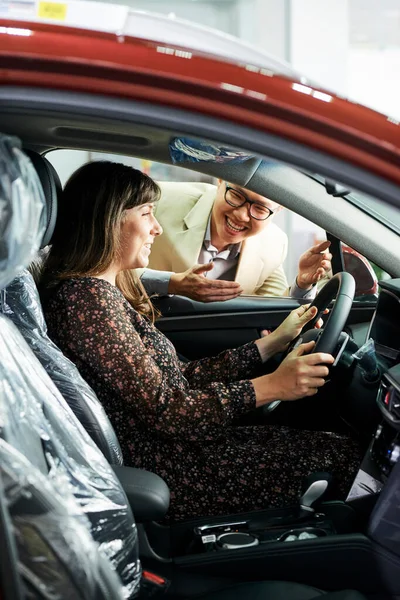 Young Beautiful Woman Sitting Wheel New Car Talking Asian Manager — Stock Photo, Image