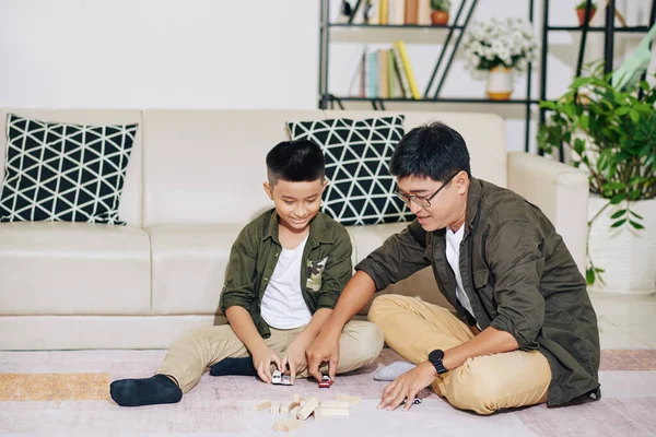 Vietnamese Father His Preteen Son Playing Toy Cars Crashing Towers — Stock Photo, Image