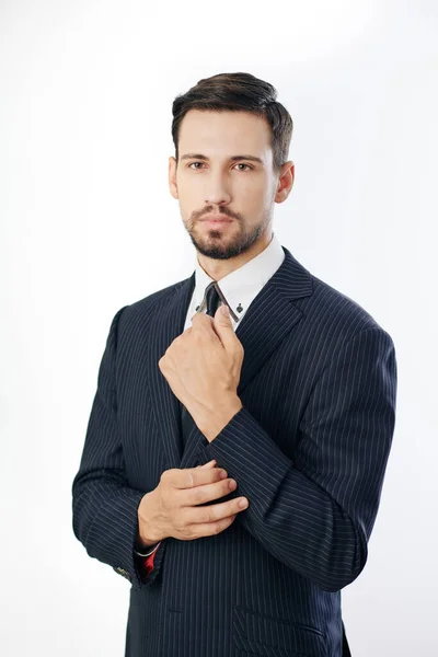Portrait Confident Serious Entrepreneur Adjusting Sleeve Looking Camera Isolated White — Stock Photo, Image