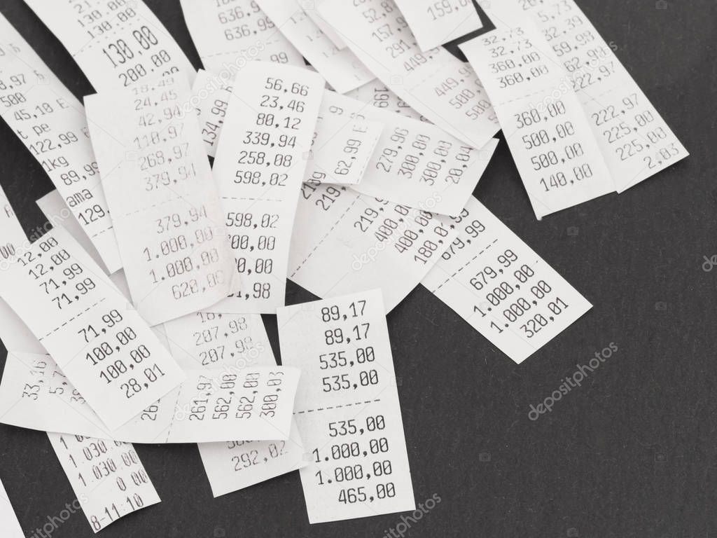 pile of shopping receipts with costs 