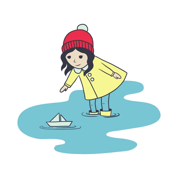 Das kleine Mädchen in Regenmantel und Gummistiefeln wirft ein Papierboot in eine Pfütze. im Cartoon-Stil. isoliert auf weißem Hintergrund. Kind, Kind Charakter Vektor Illustration — Stockvektor