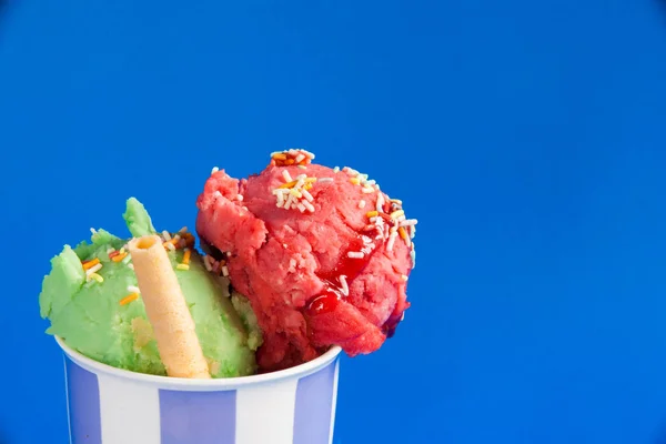 Two ice cream  green and strawberry — Stock Photo, Image