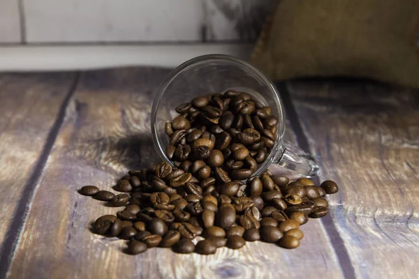 Coffee beans and sack — Stock Photo, Image