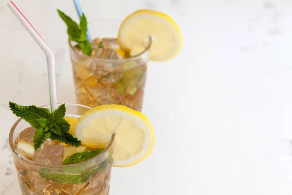 Two Iced Tea Glasses Peppermint Straw Lemon Slice Close White — Stock Photo, Image