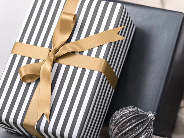 Elegant package of present box with bow.