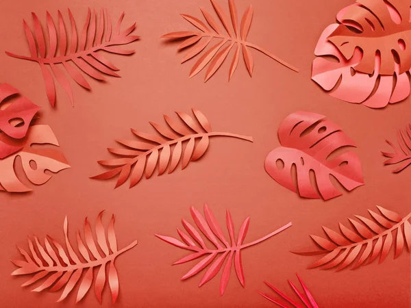 Paper leaves of living coral color.