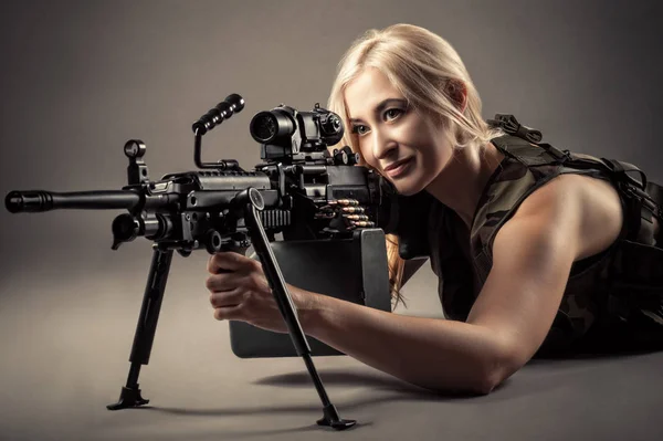 Beautiful Blond Woman Aiming Machine Gun While Lying Floor — Stock Photo, Image