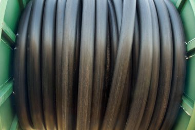 arka plan ve doku siyah boru hortum rulo.