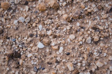 üstten görünüm çakıl çakıl ve kum arka plan üzerinde Kapat