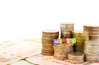 Tayland baht sikkeleri üzerinde banknot evin arka plan tasarruf