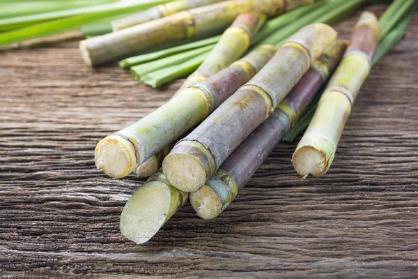 Chiudere Canna Zucchero Sfondo Legno Vicino — Foto Stock