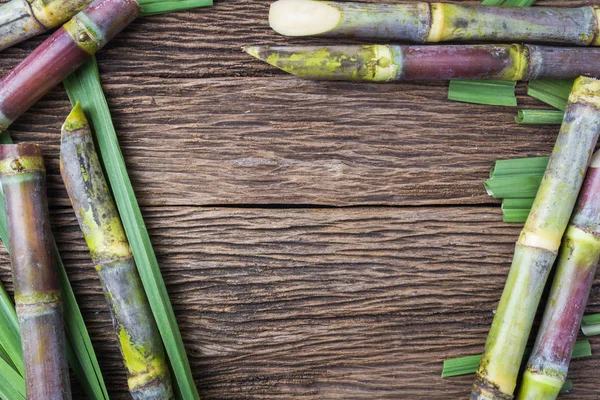 Cerrar Caña Azúcar Sobre Fondo Madera Cerca —  Fotos de Stock