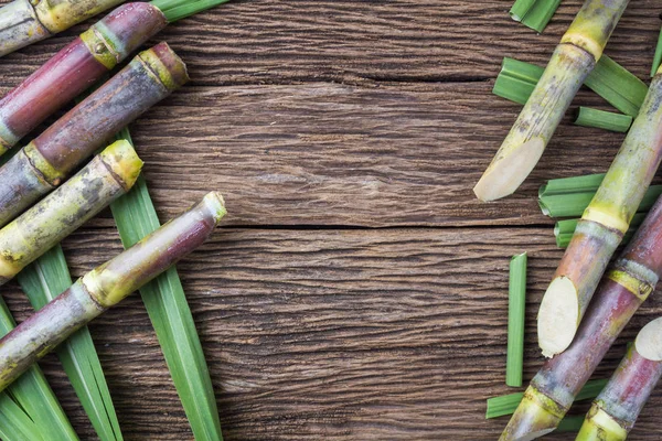 Cerrar Caña Azúcar Sobre Fondo Madera Cerca — Foto de Stock