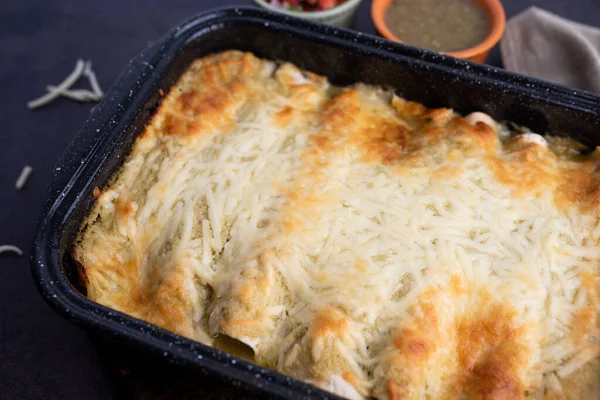 Honey lime chicken enchiladas with toppings — Stock Image Honey Lime Chicken Enchiladas Toppings Stock Image
