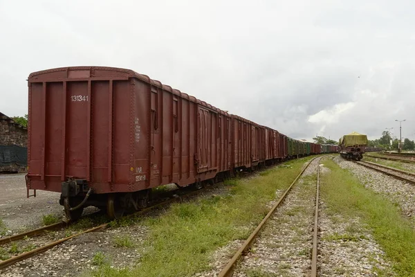 Freight train on the railway station in Dong Ha, Vietnam