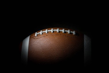 Amerikan futbolu koyu arka plan üzerinde. Süper kase