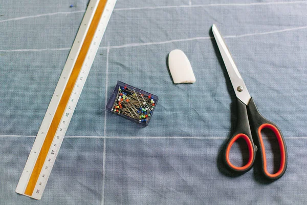 Tailor Work Table Close Ruler Scissors Chalk Needles Pins — Stock Photo, Image