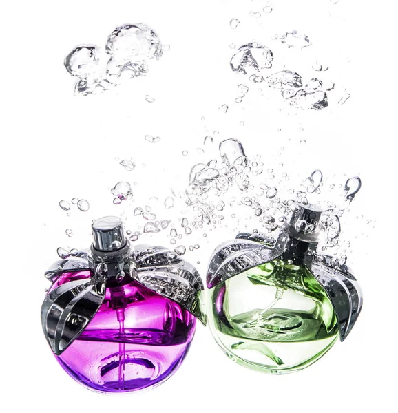 Hermosas Botellas Perfume Salpicaduras Agua Sobre Fondo Blanco Negro — Foto de Stock