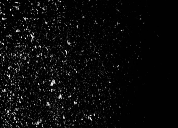 kar üzerinde siyah bir arka plan dokusu